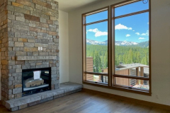 Stone-Fireplace-and-Living-Rm-View