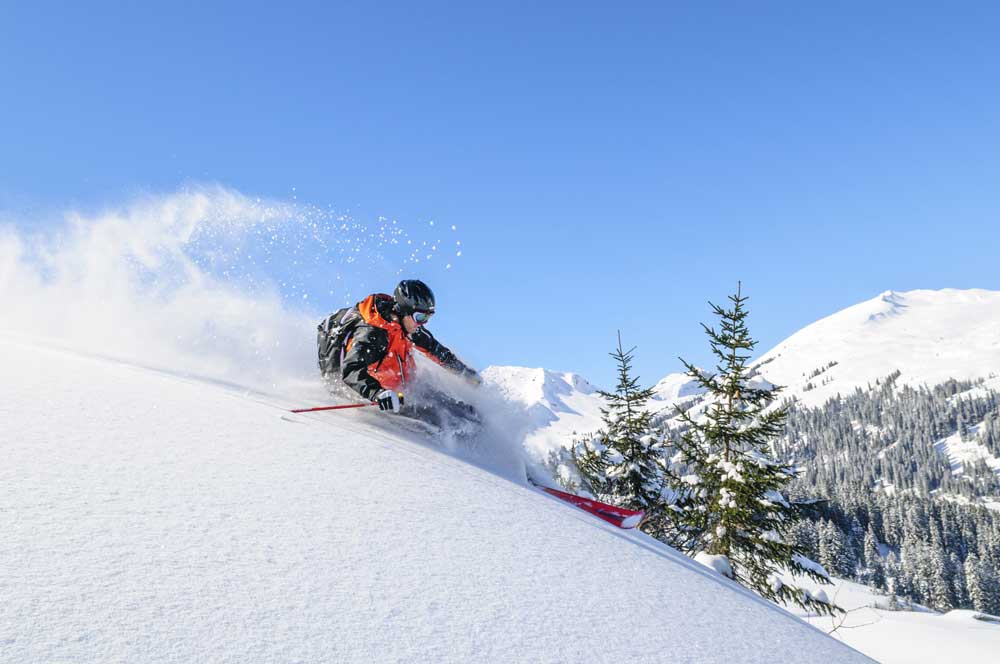 man skiing downhill. winter recreation concept