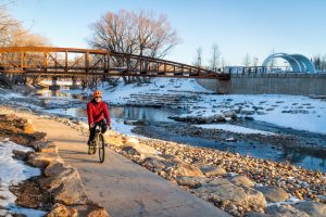 woman riding bike in Winter Park, Colorado