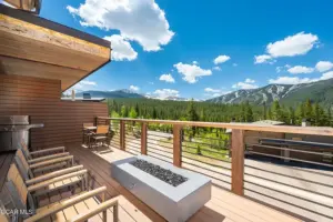 Looking towards the mountains from the deck of a luxury home in Winter Park CO