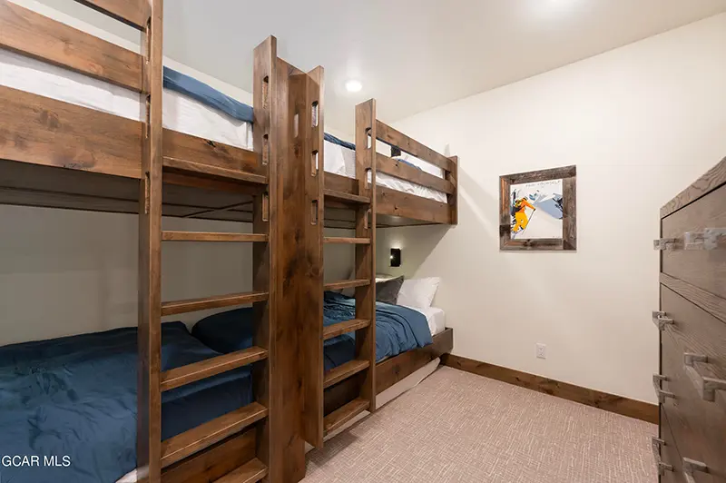 Bedroom with 4 bunk beds in a ski home in Winter Park CO