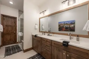 Bath with double vanities in a luxury Winter Park home