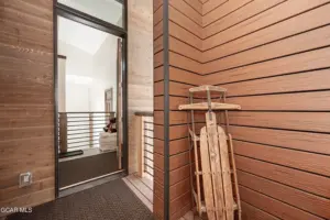 Entry way in The Reserve with a wood sled propped in the corner