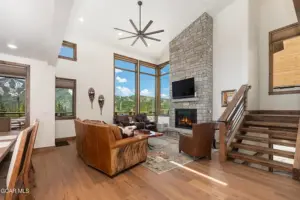 Furnished living room in The Reserve looking towards the windows